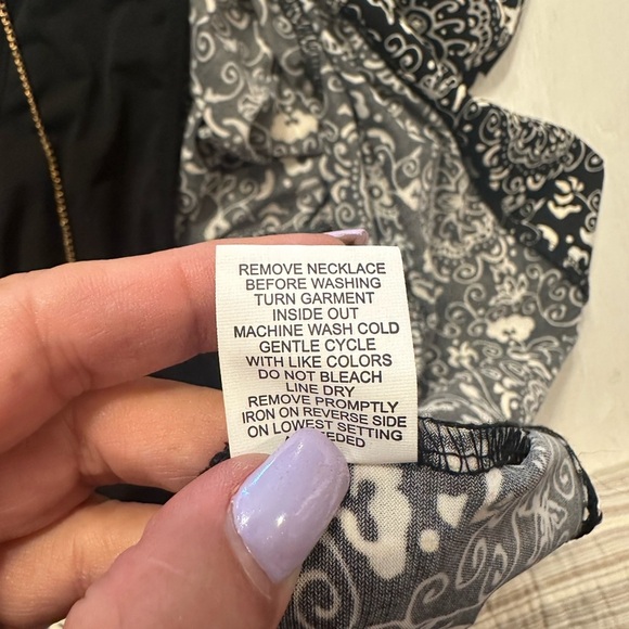 Elegant Black and White Blouse with Layered Design - Picture 9 of 11